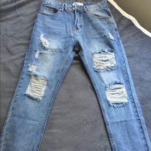 Distressed Light-washed Denim Boyfriend Jeans